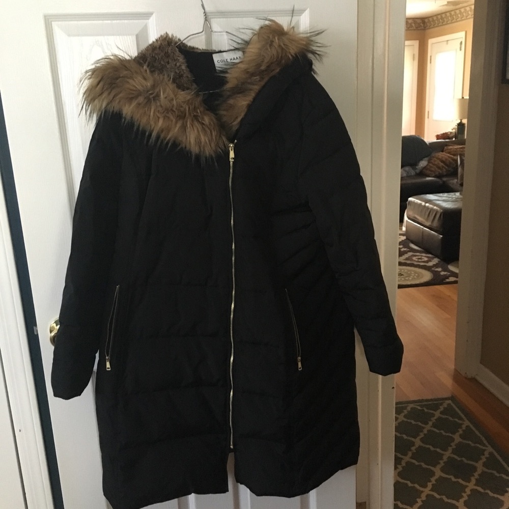 Cole Haan winter coat with faux fur hood detail.